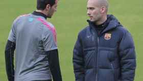 Sergio Busquets y Pep Guardiola / EFE