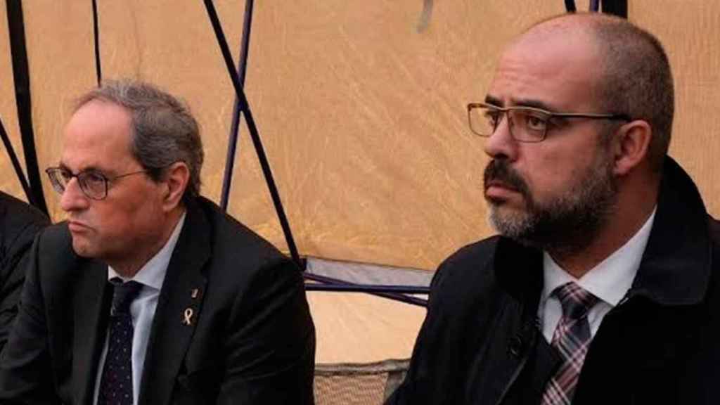 El presidente de la Generalitat, Quim Torra  (i.), y el 'conseller' de Interior, Miquel Buch (d.) / EP