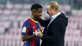 Ansu Fati y Ronald Koeman tras un encuentro / EFE