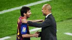 Leo Messi con Guardiola / EFE