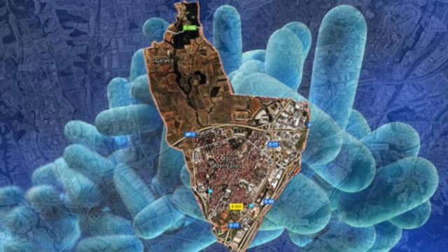 Vista aérea de Mollet del Vallès con una bacteria de legionela de fondo / CG
