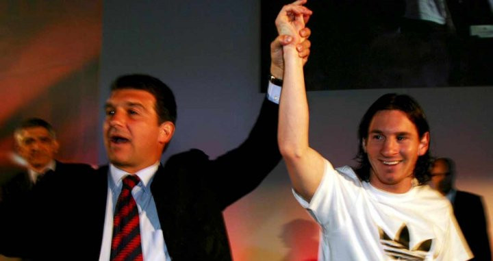 Laporta, en un acto junto a Leo Messi | EFE