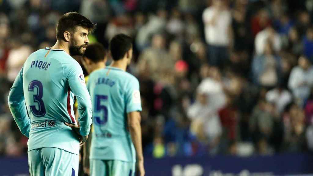 Piqué y Busquets en una imagen de archivo / EFE