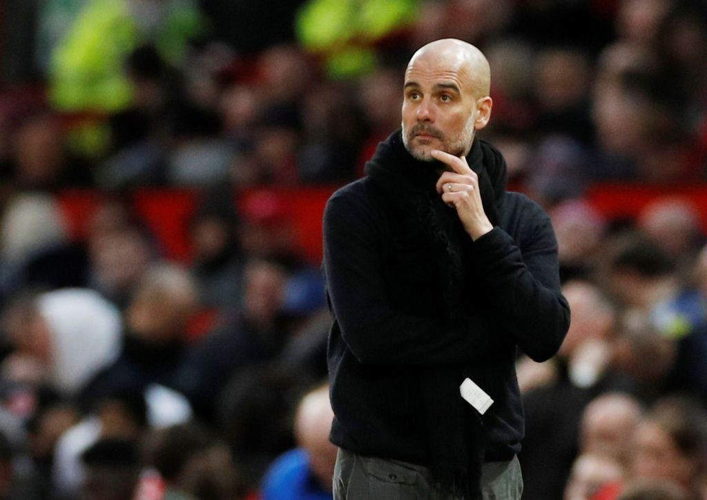 Pep Guardiola en el banquillo del Manchester City /REDES