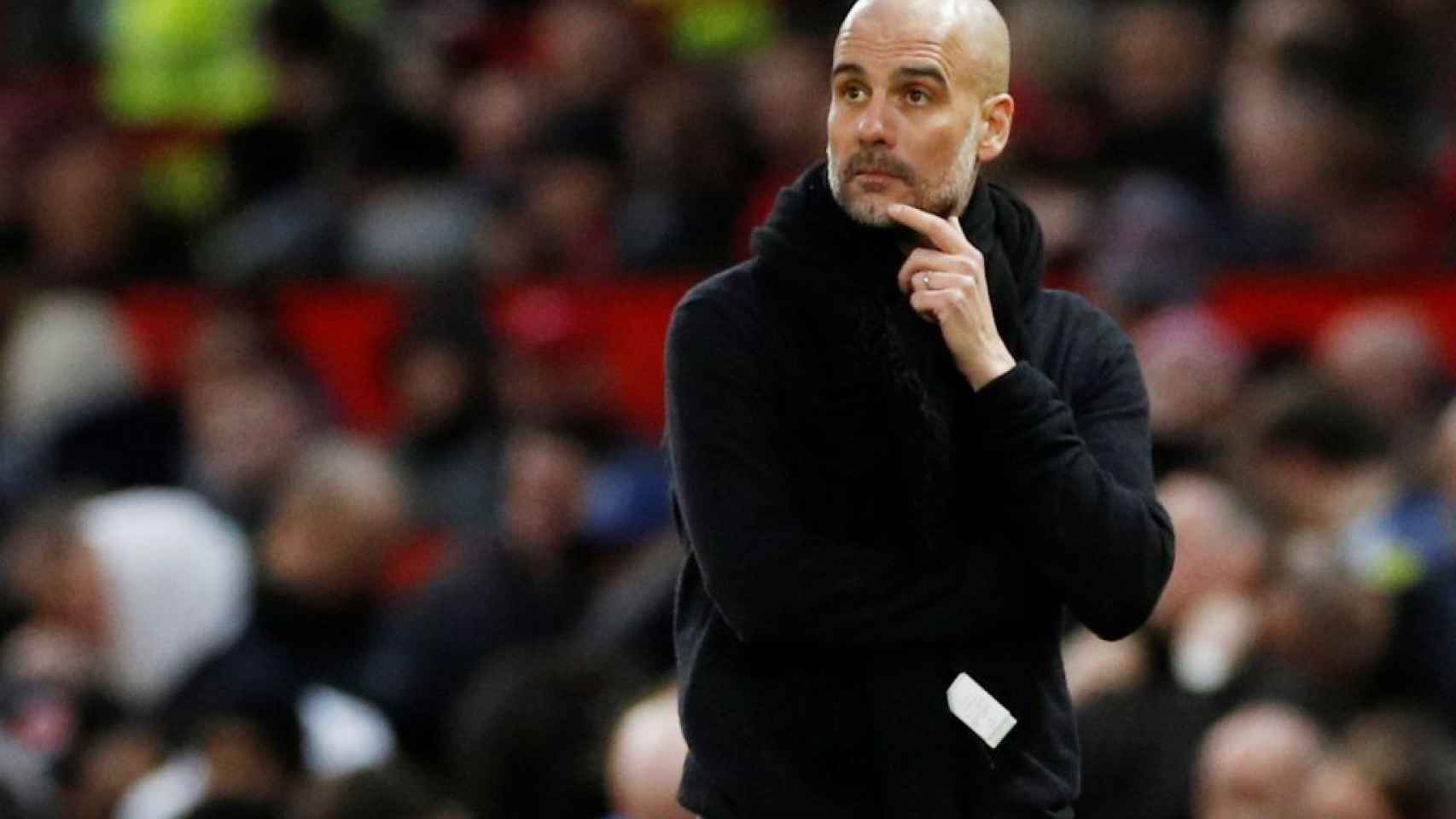 Pep Guardiola en el banquillo del Manchester City /REDES