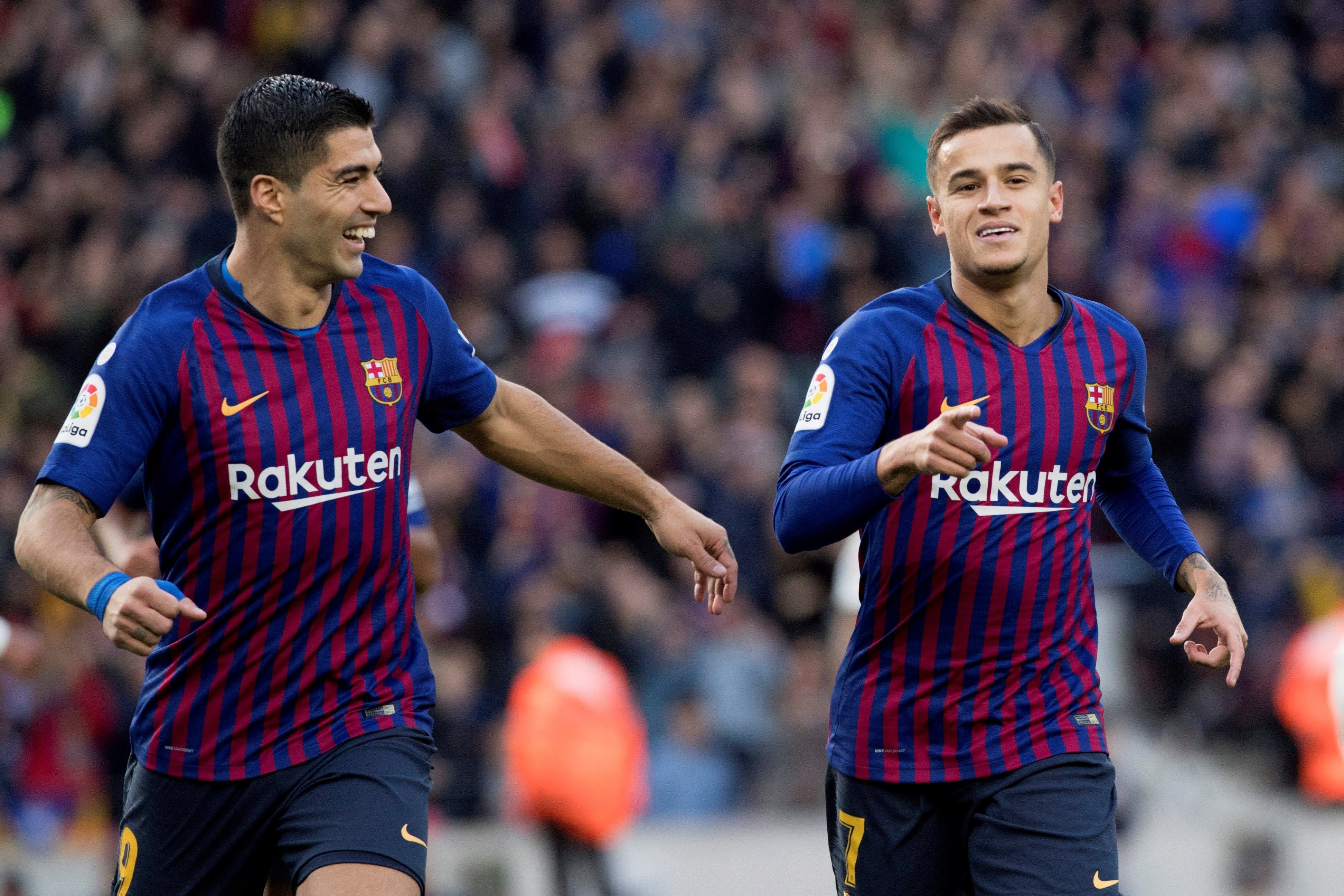 Luis Suárez y Coutinho, dos cracks que triunfaron en el Liverpool antes de fichar por el Barça / EFE