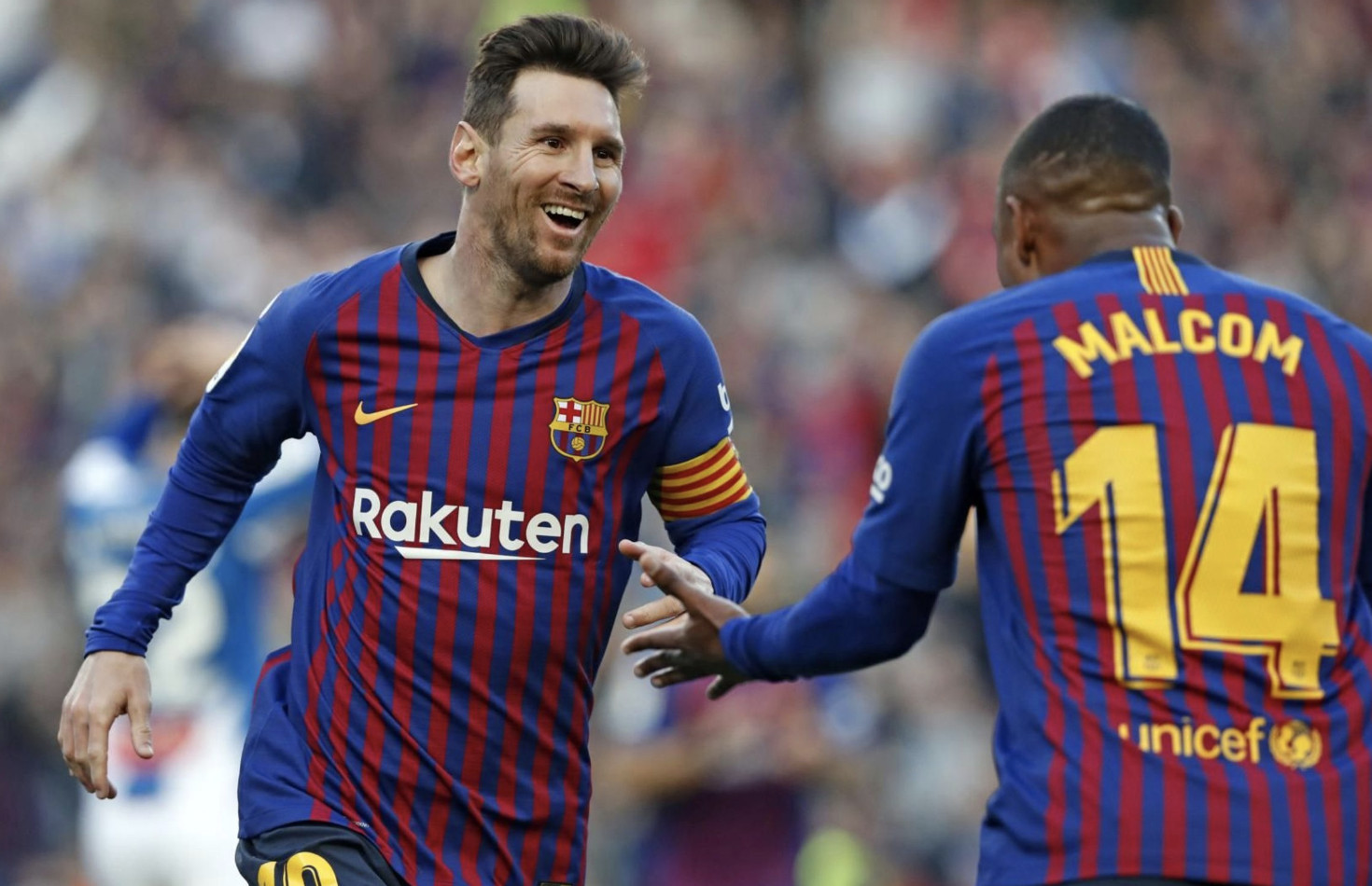 Una foto de Leo Messi y Malcom celebrando un tanto ante el Espanyol / FCB