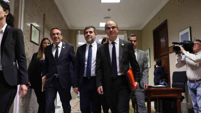 Los políticos presos Josep Rull, Jordi Sánchez y Jordi Turull, en el Congreso de los Diputados en una imagen de archivo / EP