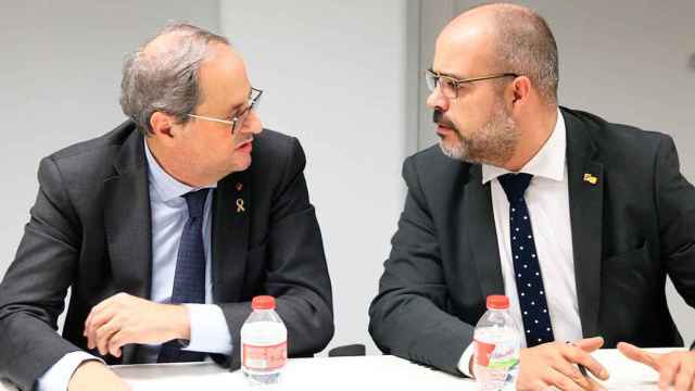 Quim Torra, presidente de la Generalitat, y el consejero de Interior, Miquel Buch / EFE