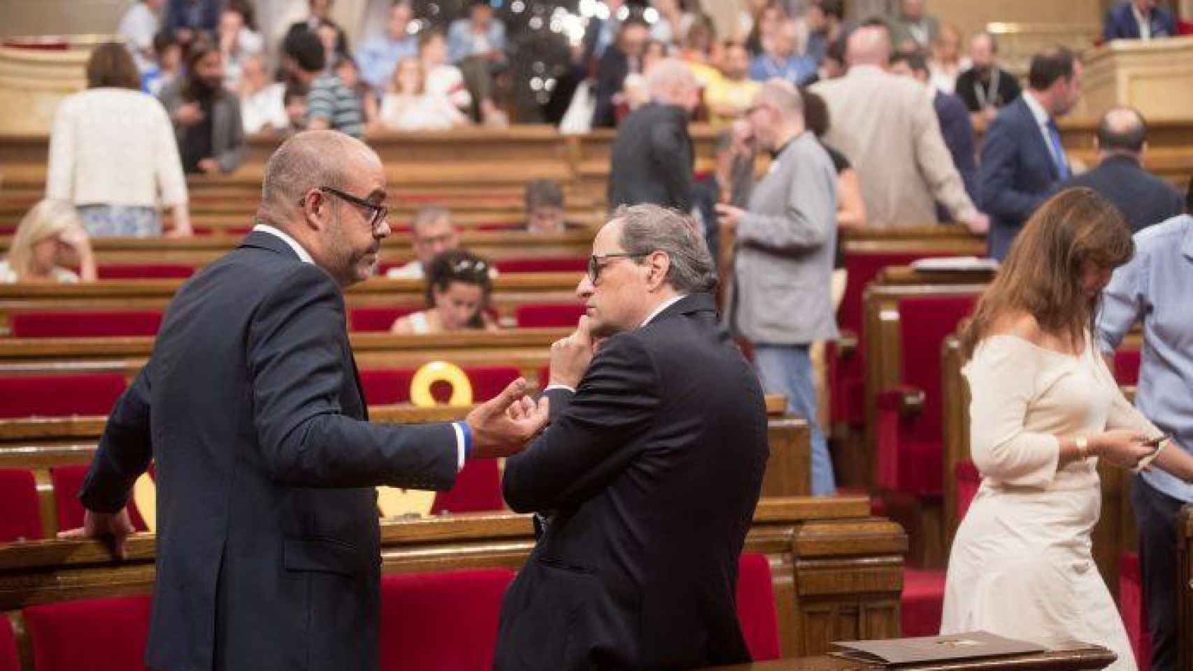 Imagen de Miquel Buch y Quim Torra en el Parlament / EFE