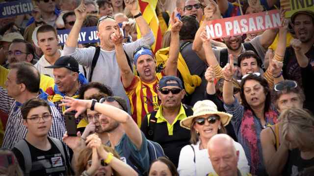 EuropaPress 2004774 16 march 2019 spain madrid people hold placards as they take part in the