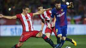 Una foto de archivo de Messi en un partido frente al Girona / EFE