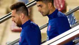 Luis Suárez con Leo Messi en un entrenamiento / EFE