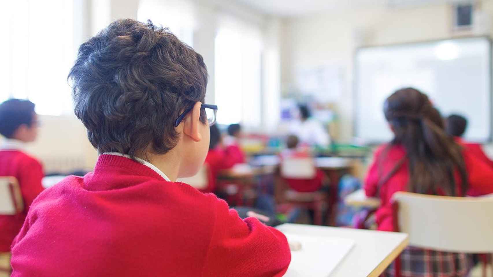 Niños en una clase de Religión / EP