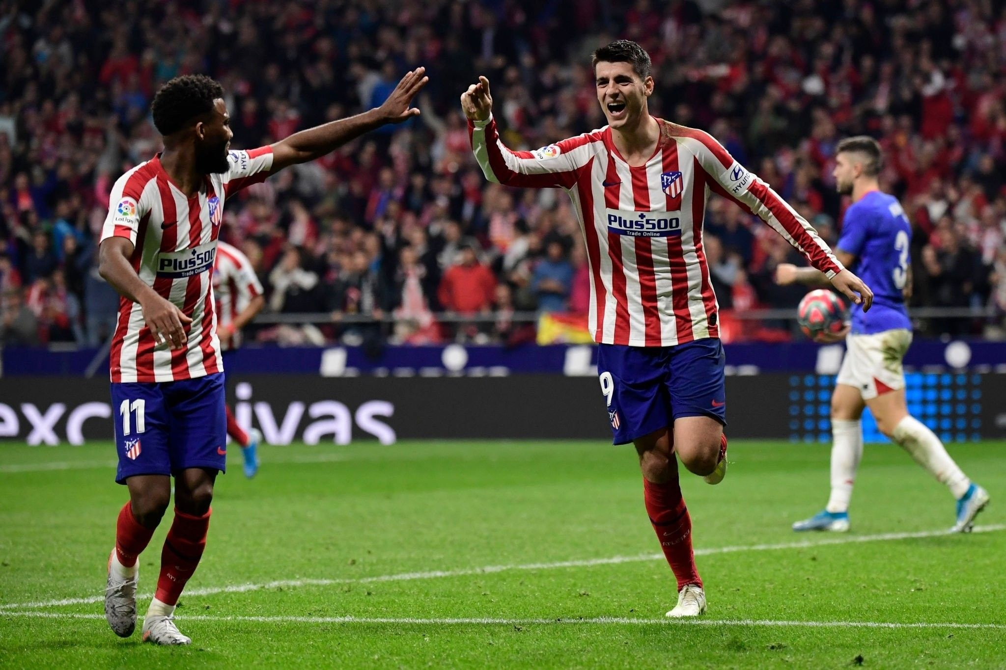 Thomas Lemar y Álvaro Morata celebrando un gol del Atlético de Madrid / EFE