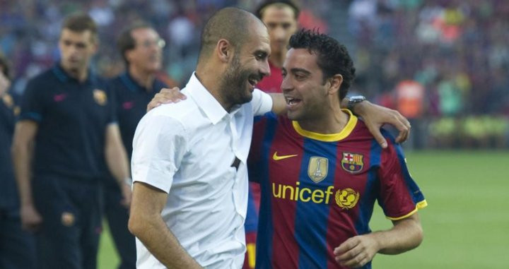 Xavi, junto a Pep Guardiola en su etapa en el Barça / REDES