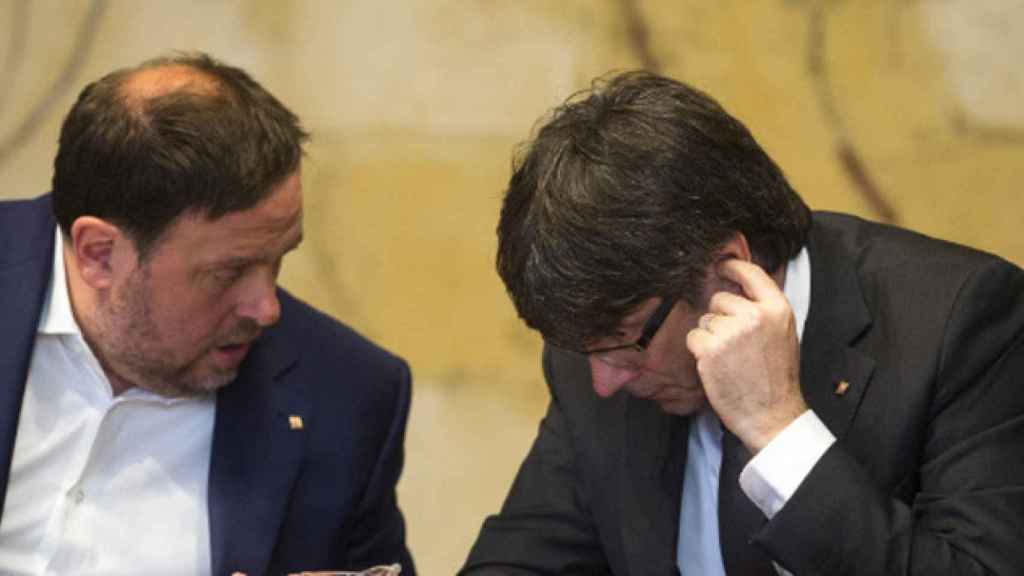 El vicepresidente de la Generalitat, Oriol Junqueras (d) y el President, Carles Puigdemont / CG