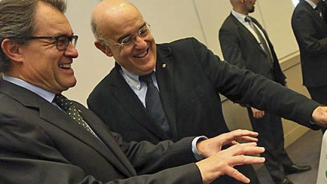 El presidente de la Generalidad, Artur Mas, y el consejero de Salud, Boi Ruiz