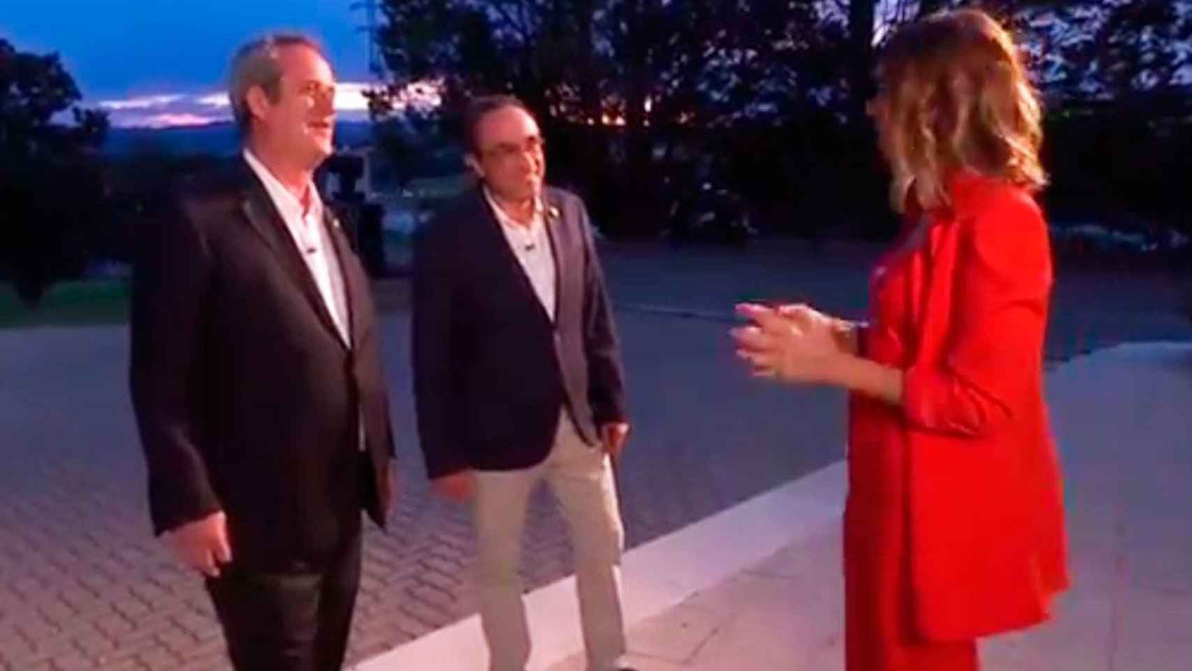 Joaquim Forn y Josep Rull, con la presentadora de 'FAQs' de TV3 / CCMA