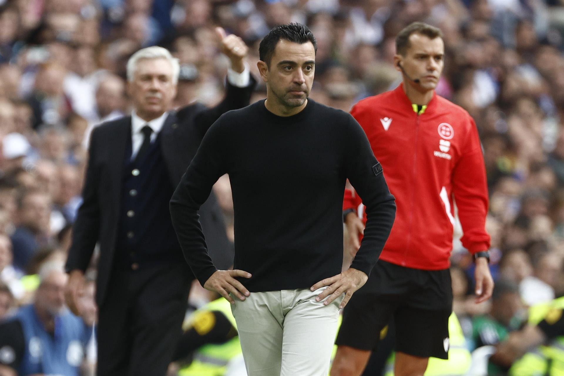 Xavi, decepcionado, en el Bernabéu / EFE