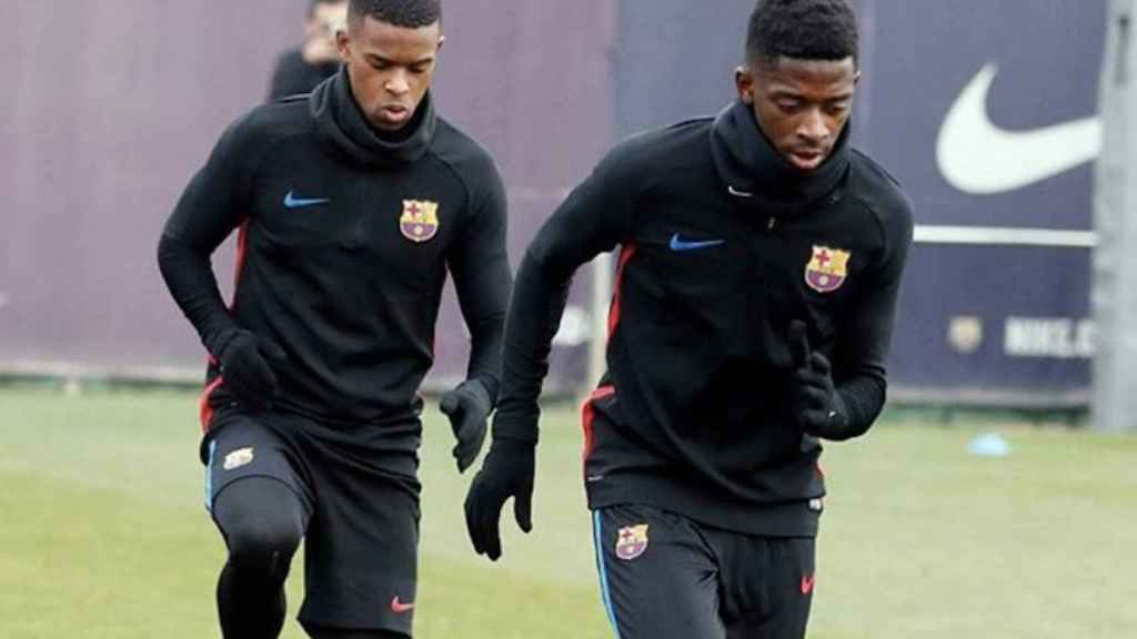 Imagen de archivo de Semedo y Dembelé en un entrenamiento con el Barça / EFE