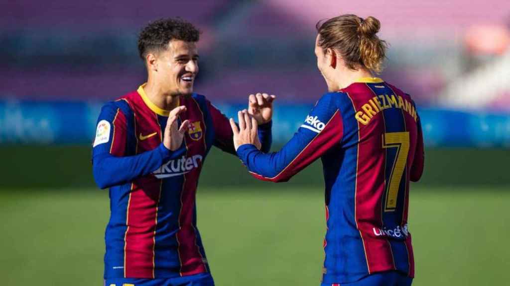 Griezmann, junto a Coutinho, luciendo el dorsal 7 en su camiseta / FCB