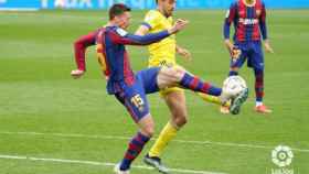 Lenglet, en el momento de cometer penalti contra el Cádiz | LaLiga