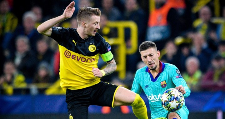 Marco Reus en un choque con Lenglet / EFE