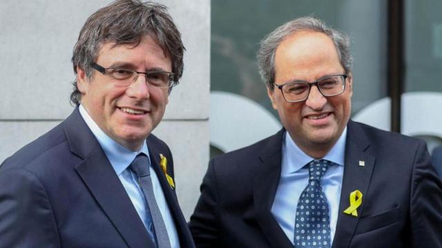 Carles Puigdemont y Quim Torra, en una imagen de archivo / EFE
