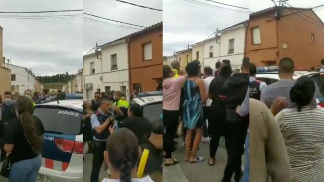 Fotogramas de como decenas de personas increpan y rodean a dos mossos en Figueres / CG