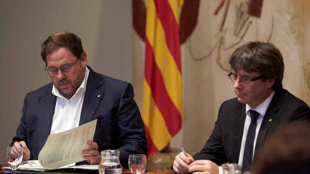 Oriol Junqueras junto a Carles Puigdemont en una imagen de archivo / EFE