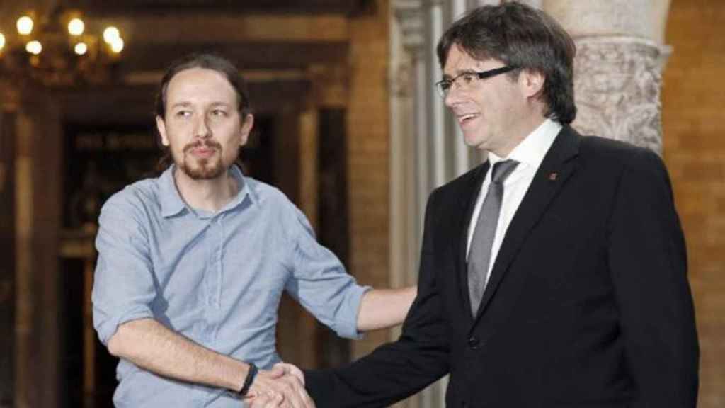 El líder de Podemos, Pablo Iglesias, y el presidente de la Generalitat, Carles Puigdemont.