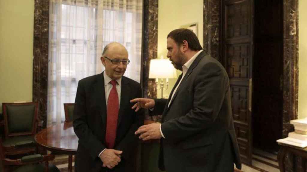 El ministro de Hacienda, Cristóbal Montoro, y el vicepresidente de la Generalitat, Oriol Junqueras.