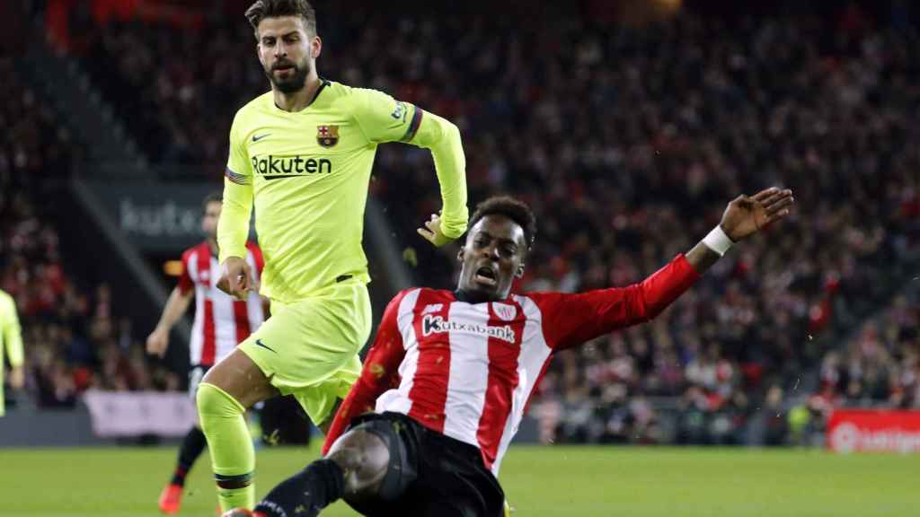 Gerard Piqué e Iñaki Williams en un Athletic-Barça / EFE