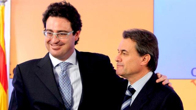 El exsecretario de Comunicación y Estrategia de CDC David Madí, junto a Artur Mas