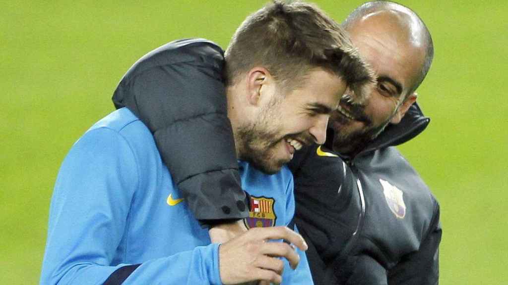 Gerard Piqué y Pep Guardiola, durante su etapa en el Barça