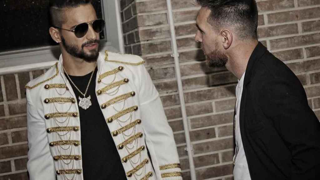 Messi y Maluma en un concierto