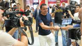 Xavi Hernández, durante la presentación de un campus de fútbol infantil / EFE