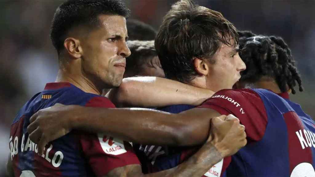 Joao Cancelo y Joao Félix celebran la goleada al Betis