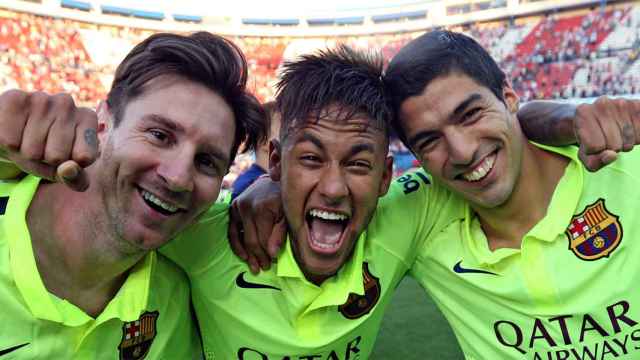 Leo Messi, Neymar Jr y Luis Suárez, celebrando un título con el Barça
