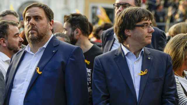 El líder de ERC, Oriol Junqueras, y el expresidente de la Generalitat, Carles Puigdemont