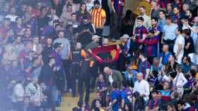 Peleas en las graderias en el clásico Barça - Real Madrid