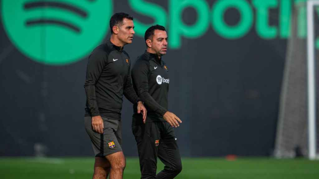 Rafa Márquez y Xavi Hernández, en el entrenamiento conjunto del primer equipo del Barça y el filial