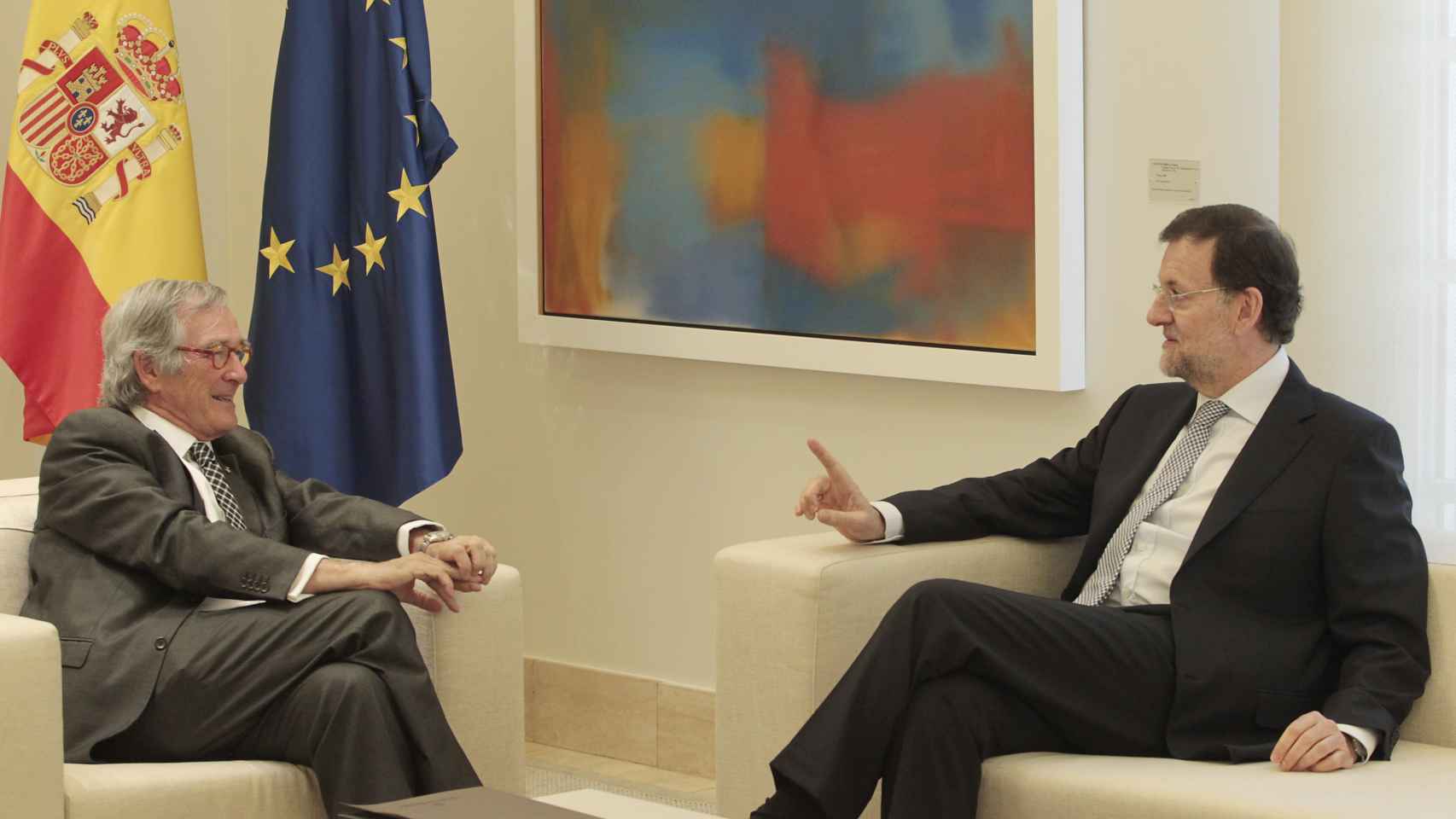 El expresidente del Gobierno, Mariano Rajoy, en una reunión con el exalcalde de Barcelona Xavier Trias
