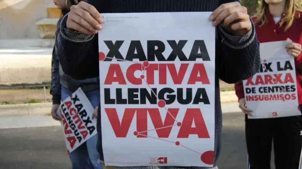 Uno de los carteles durante la presentación de la Xarxa