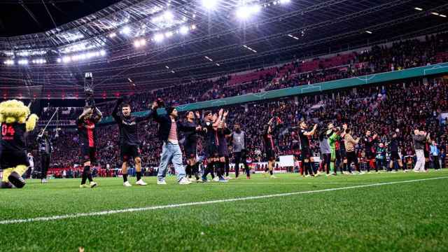 Los jugadores del Bayer Leverkusen celebran una victoria en la Bundesliga