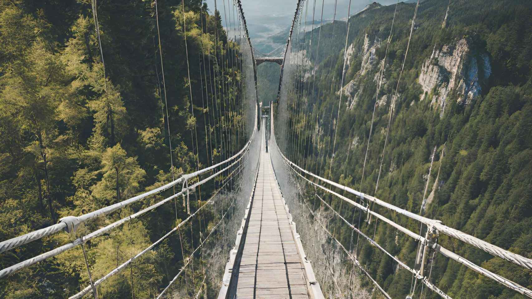 Imagen de un puente colgante en la montaña generada con IA