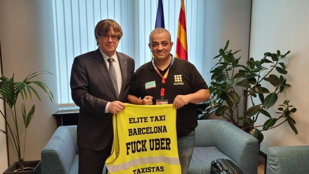 El 'expresident' prófugo, Carles Puigdemont, y Tito Álvarez, líder del taxi de Barcelona