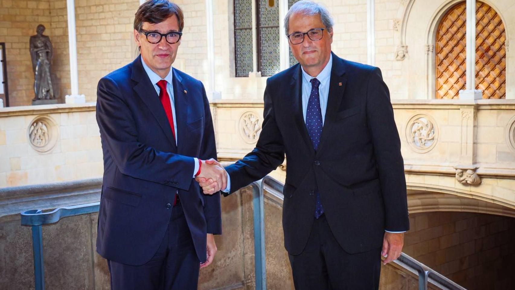 Salvador Illa, recibiendo a Quim Torra en el palacio de la Generalitat