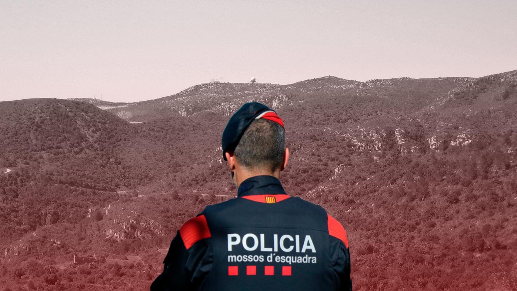 De fondo el Parque Natural del Garraf con un agente de los Mossos vid